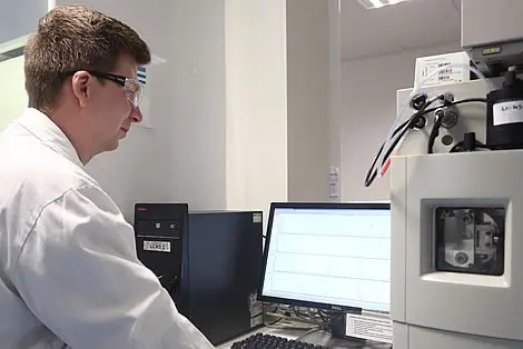 Scientist using equipment as part of out analytical chemistry services